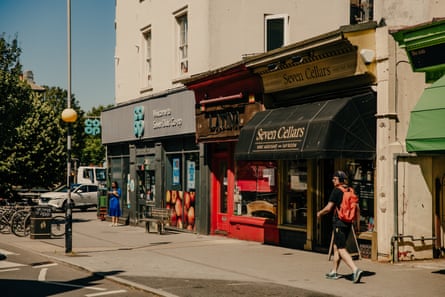 Photo of the high street with Seven Cellars and Latina next door to the Co-Op