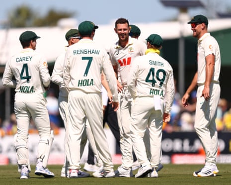 Josh Hazlewood celebrates taking the wicket of Hasan Mahmud