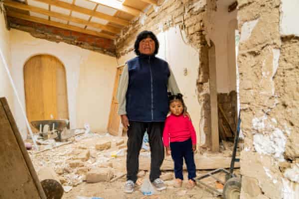 Gabriela Laruta, daughter of ASITURSO founder Tomas Laruta, with her niece at her father’s house, which the family is converting into bedrooms for tourists who they hope will come for homestays in the community.