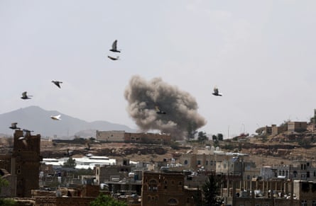 Dust rises from the site of a Saudi-led air strike in Sana’a, Yemen, on 30 March.