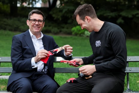 Andy Burnham with Josh Turner, holding the Burnham socks.