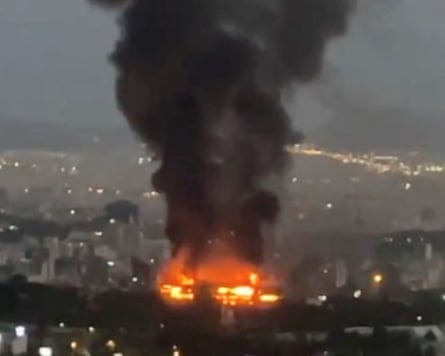 Smoke rising from a large fire in Tehran