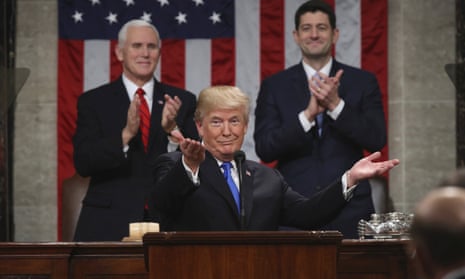 Donald Trump delivers his first State of the Union address on 30 January 2018 in Washington, as Vice President Mike Pence and House Speaker Paul Ryan applaud. 