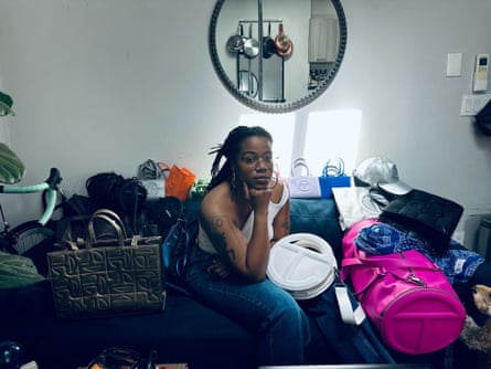 Demi Elder at home with her collection of Telfar pieces.