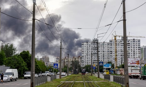 Smoke rises from a residential area in Kyiv 
