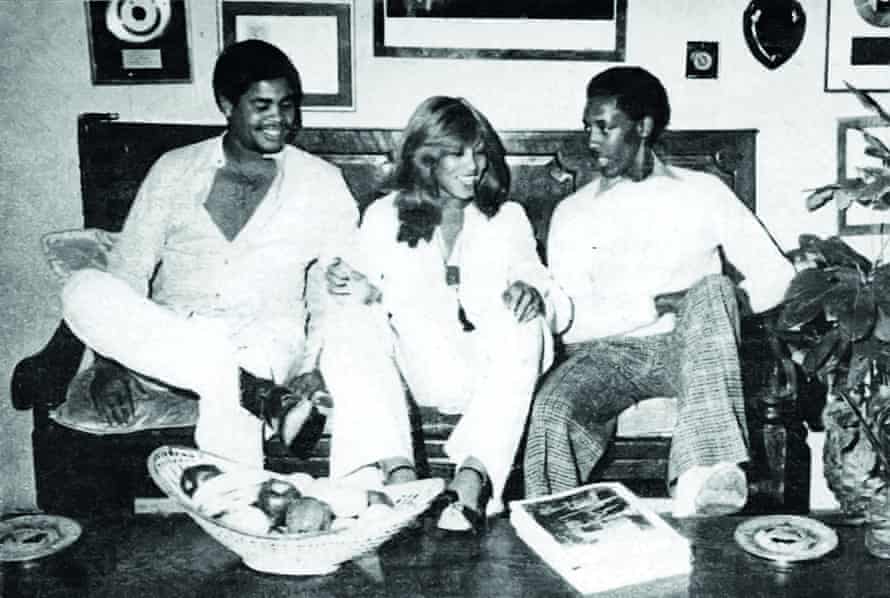 Turner sharing a laugh with sons Craig (left) and Ronnie.