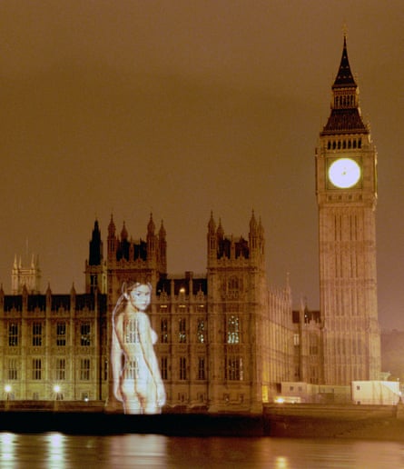 A nude picture of TV presenter Gail Porter is projected on to the Houses of Parliament at midnight.