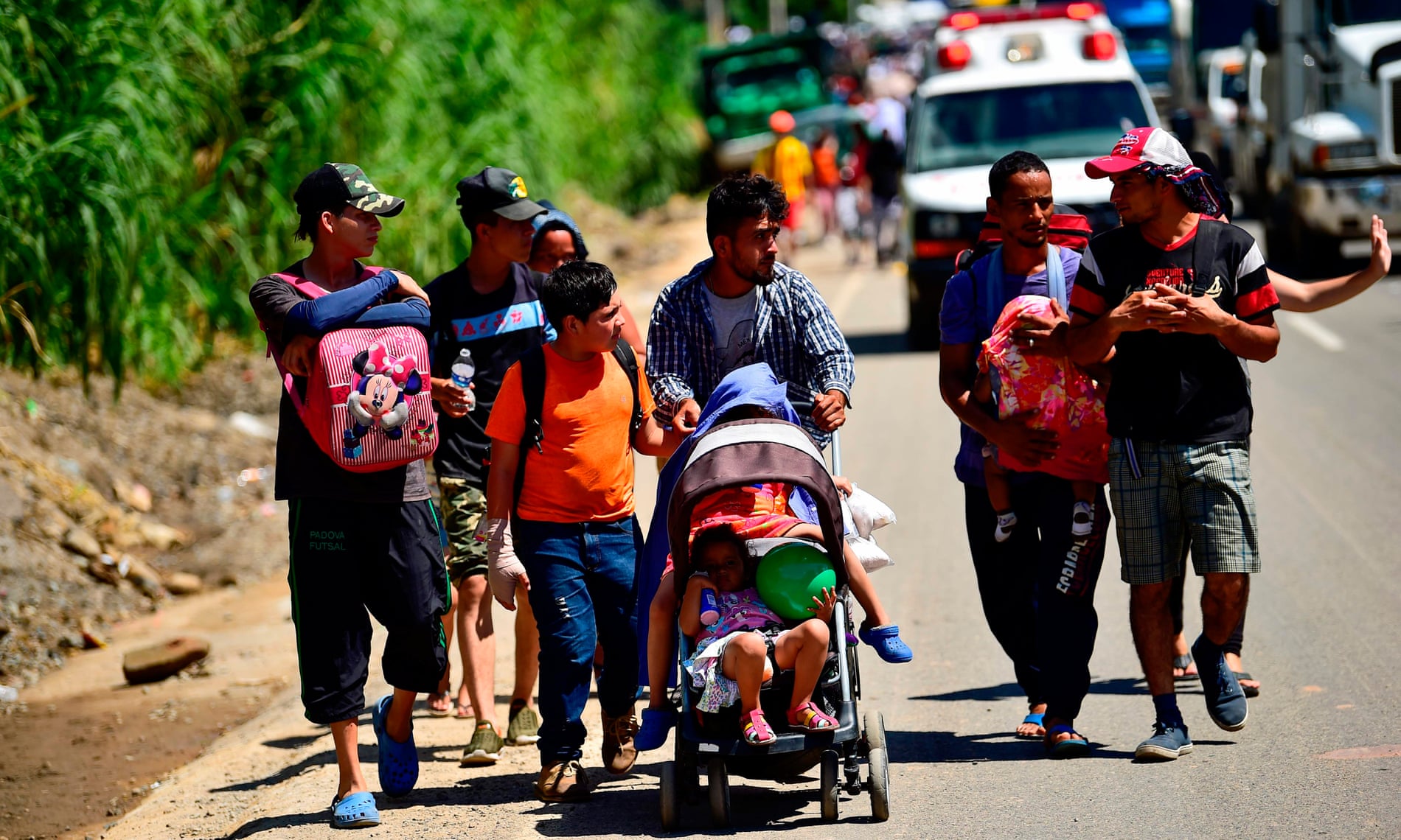 Honduran migrants take part in a caravan heading to the US, in the outskirts of Tapachula, on their way to Huixtla, Chiapas state, Mexico.