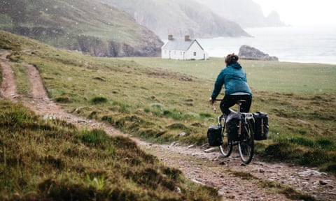 Bike to the bothy … a cyclist approaching Kearvaig Bay, Scotland.
