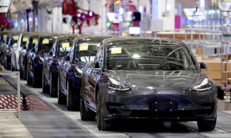 Tesla China-made Model 3 vehicles are seen during a delivery event at its factory in Shanghai, China, in 2020.