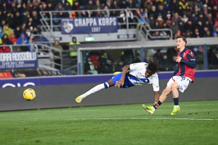 Yann Bisseck dives in to score against Bologna