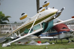 An airplane overturned by a likely tornado produced by the outer bands of Hurricane Ian is shown at North Perry Airport in Pembroke Pines
