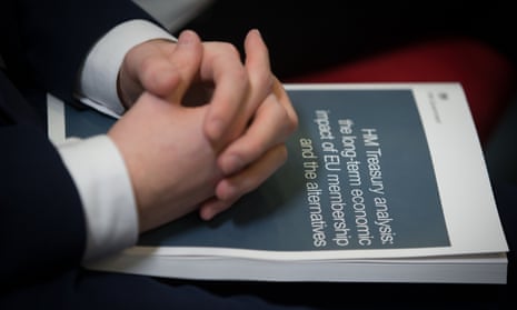 Man's hands rest on Brexit documents