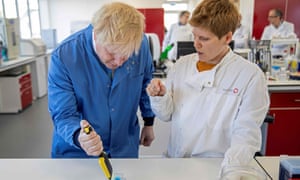 Britain’s Prime Minister Boris Johnson visits to the Mologic Laboratory in the Bedford technology Park, north of London.