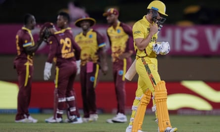 Uganda’s Riazat Ali Shah walks off for three in West Indies 134-run win at the T20 World Cup.