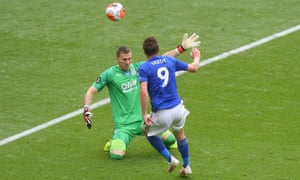 Leicester City’s Jamie Vardy scores their third goal.