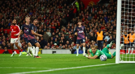 Manchester United's Bryan Mbeumo scores their first goal.