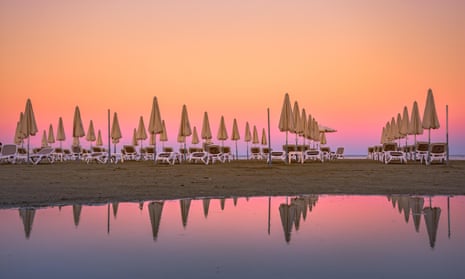 Sunbeds on the beach of Larnaca, Cyprus.