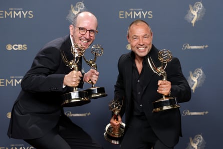 Jack Thorne and Stephen Graham at the 2025 Emmy awards holding trophies.