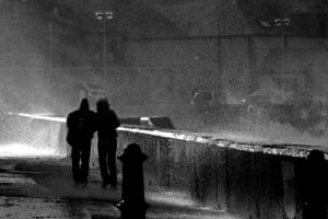Walking in a StormA couple captured walking in a storm along the sea front in Eyemouth, Scotland Photograph: Stephen Morris/GuardianWitness