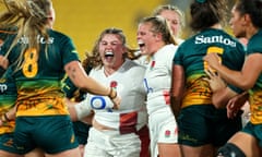 Maud Muir and Connie Powell of England celebrate a turnover during the WXV1 match between England and Australia at Sky Stadium.