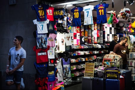 Stall selling replica football shirts in Barrio Gotico, Barcelona.