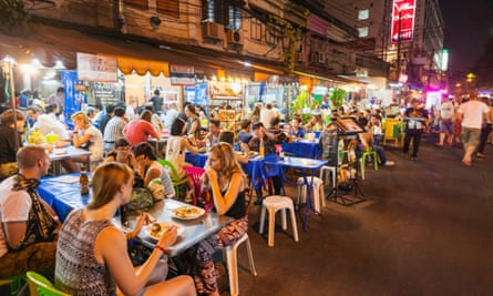 Tourists visit restaurants along Bangkok’s Khaosan Road.