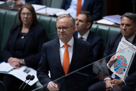 Anthony Albanese holding a folder