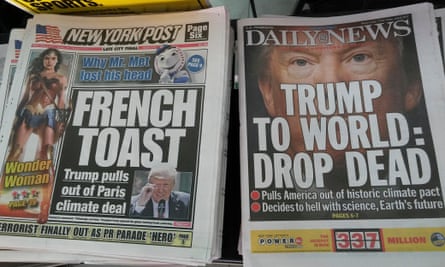 front pages of two new york newspapers with contrasting headlines about the withdrawal of the us from the paris climate agreement, june 2017