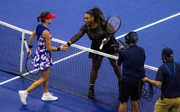 Adjla Tomljanovic and Serena Williams shake hands at the net after the match.