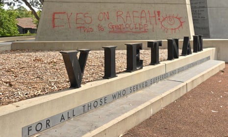 The Vietnam War Memorial on Anzac Pde in Canberra covered in pro Palestine graffiti in red paint.