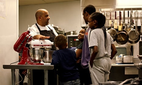 Executive chef Steven Forman of Delaware North teaches youth in the Buffalo community how to make simple desserts.