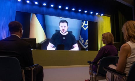 Ukraine's president, Volodymyr Zelenskiy, delivers a video address to the participants of the Ukraine recovery conference.