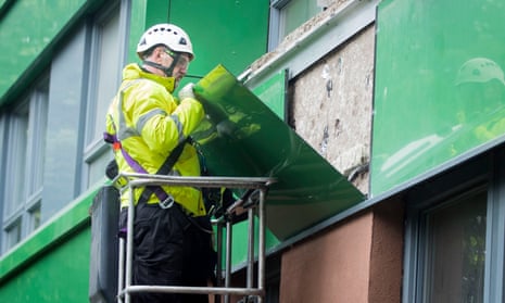 Cladding being removed from a tower block in Sheffield in 2017.
