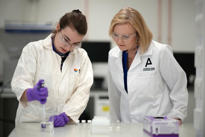 Liz Truss (right) on a visit to a life sciences laboratory at Alderley Park in Macclesfield this morning.