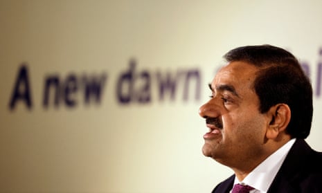 Modi-linked Adani family secretly invested in own shares, documents suggest  | India | The Guardian