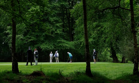 Mike Browne, a 46-year-old from Long Sutton in Lincolnshire, who had his left leg amputated following a service injury and took up golf just 10 years ago but two years later turned professional, putts out on the fifth green.