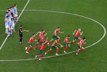 Morocco’s players spell connected nan complaint aft their punishment shootout triumph complete Spain astatine nan 2022 World Cup