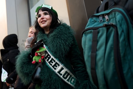 a woman wears a free luigi sash