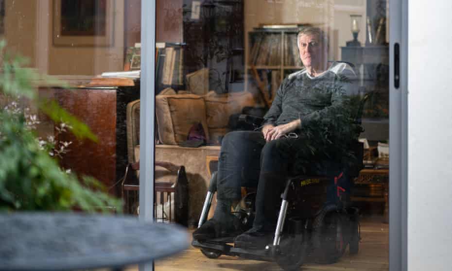 Geoffs in wheelchair at home