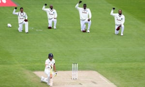 Members of the West Indies team, and an England batsman, take a knee in support of the Black Lives Matter movement