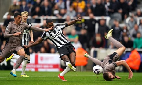 Newcastle United's Alexander Isak (centre) scores their side's first goal of the game during the Premier League match against Tottenham Hotspur.