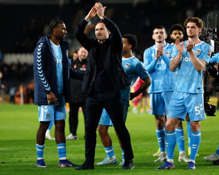 Frank Lampard claps with hands above his head as Coventry players join in the applause