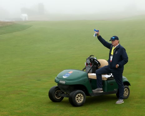 Foggy conditions at Shinnecock Hills as a rules official blows the horn to signal a suspension of play due to limited visibility on Thursday.