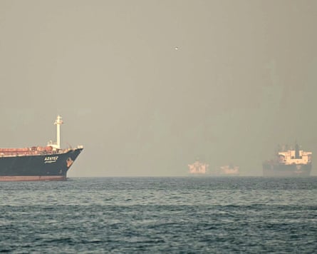 Cargo ships and tankers are seen off the coastal city of Fujairah in the strait of Hormuz in February.
