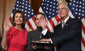 Francis Rooney, right, is sworn in in January.
