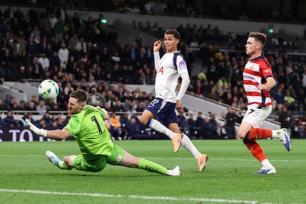 Brennan Johnson scores of Tottenham’s third goal past Doncaster’s Ian Lawlor.