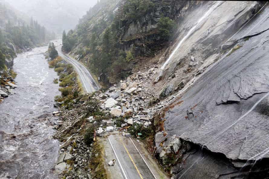 Rocks and vegetation cover Highway 70 following a landslide in the Dixie fire zone in October.