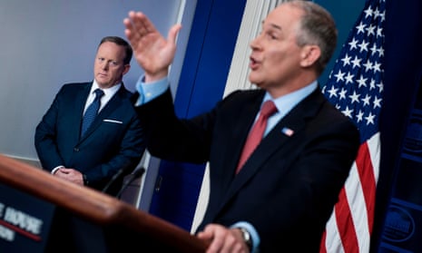 Scott Pruitt at the briefing, with Sean Spicer in the background. Pruitt said: ‘The reason European leaders want us to stay in is because they know it will continue to shackle our economy.’