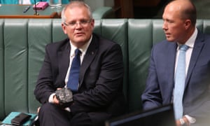 Photos of Scott Morrison with a lump of coal parliament have become an enduring symbol internationally of Australia's lack of action on climate change, says Adam Morton in this episode of Full Story.